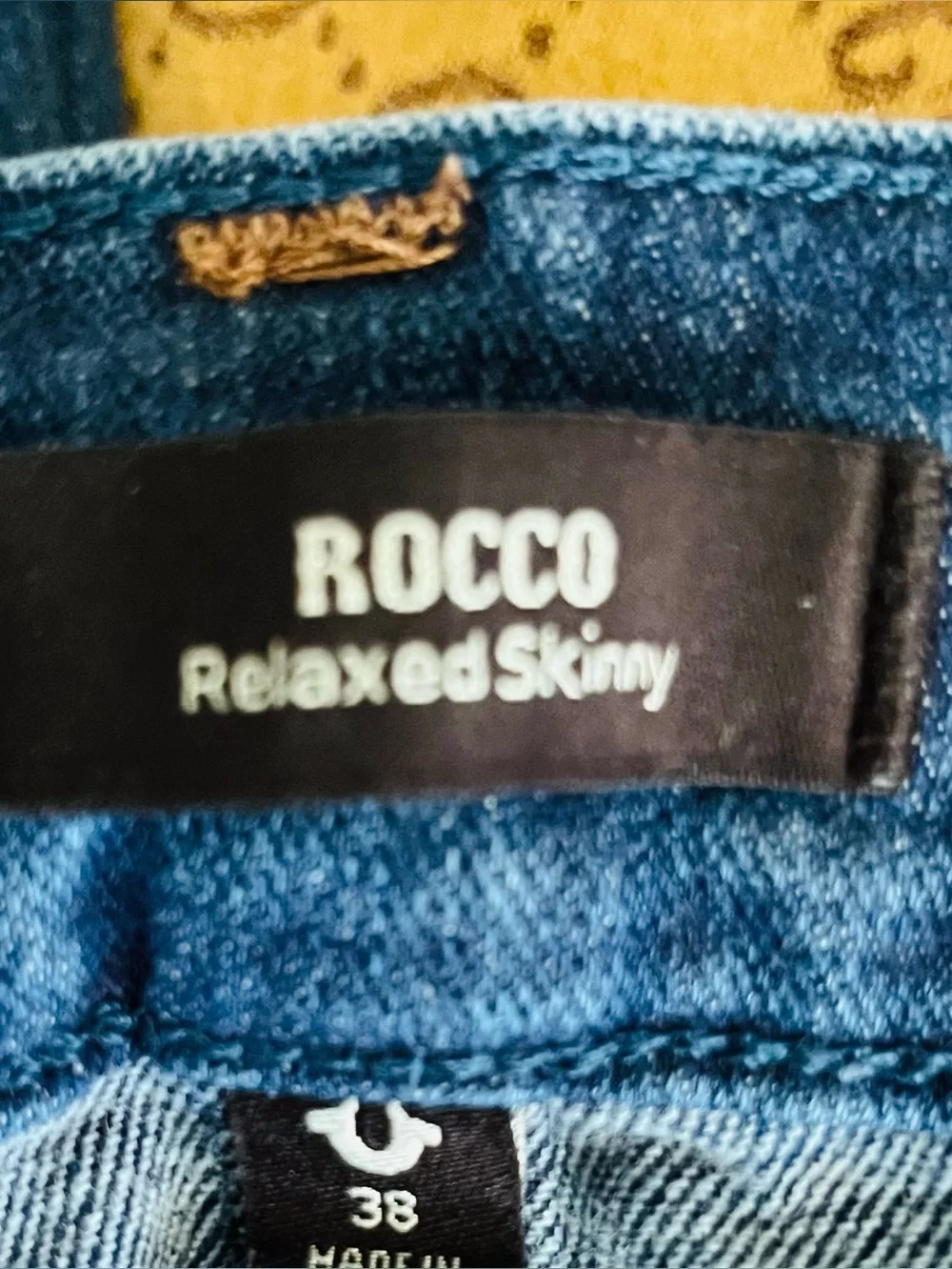 True Religion Jeans with Red Logo Patch on Blue denim NWOT pristine